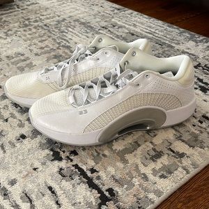 White metallic silver Air Jordan shoes